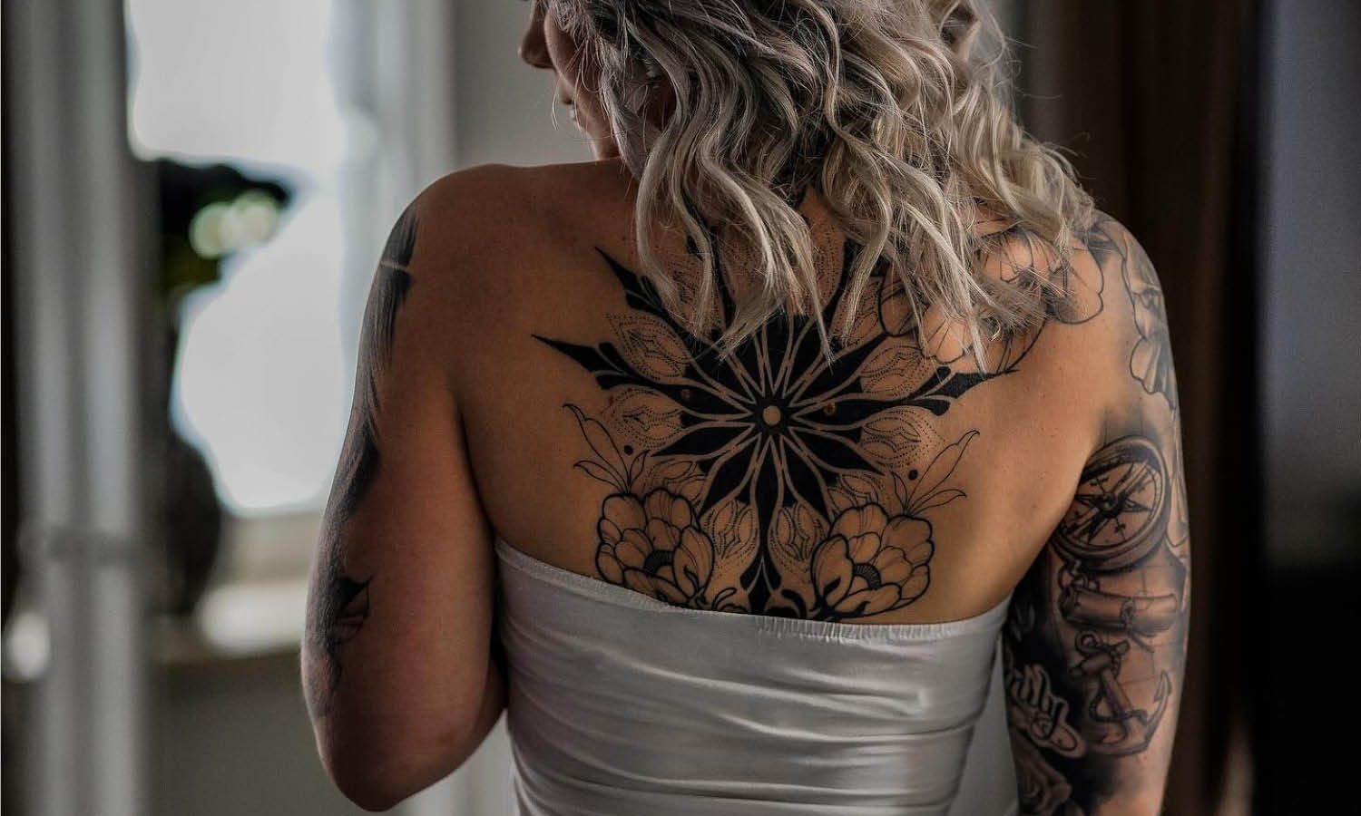 Does Tattoo Design Make a Woman More Attractive?